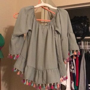 Off shoulder top with Pom Poms